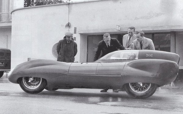Sir Stirling Moss in the closed Lotus XI